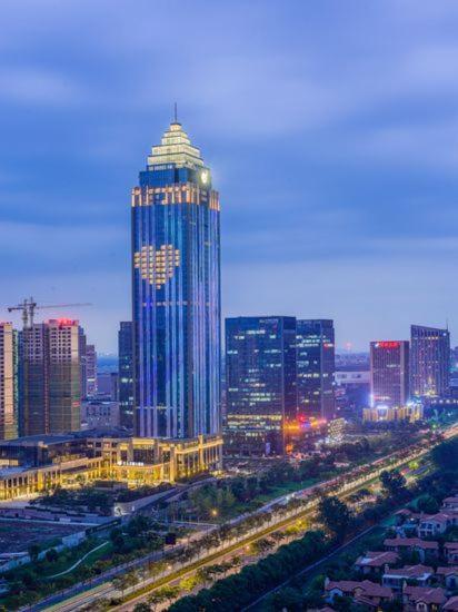 Grand New Century Hotel Haining Zhejiang Exterior foto